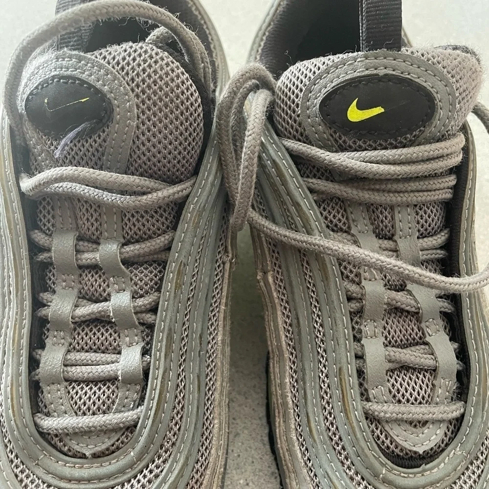 Preloved. Size 5 youth Nike fluorescent swish sneakers.